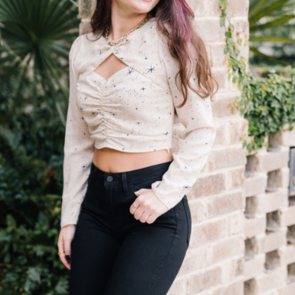 Cream star print top
